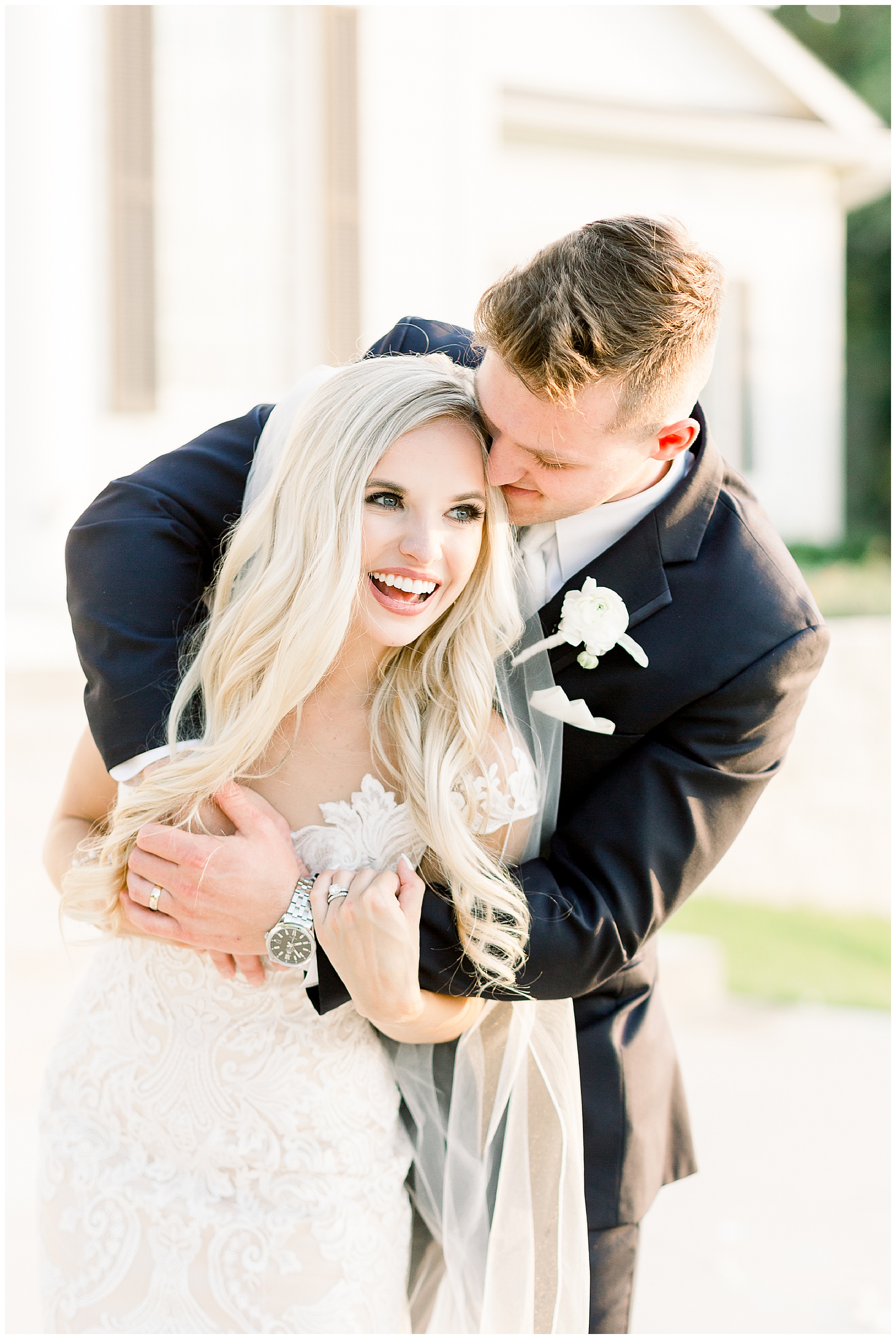 bride and groom hugging together at the milestone mansion in aubrey, tx